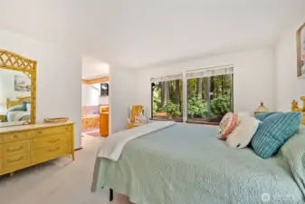 Primary bedroom en-suite. Bedroom, bathroom and closet all in one suite.