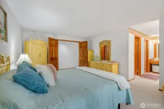 Primary bedroom with double doors