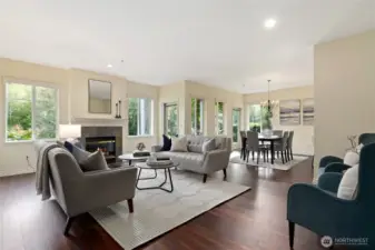 Open concept living room with lovely gas fireplace.