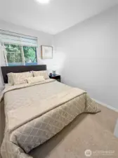 The bedroom has a bump-out on one side.