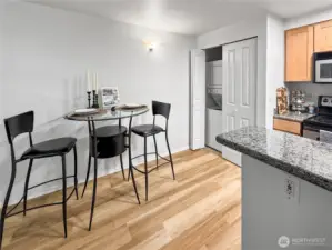 The in-unit washer and dryer are located in the laundry closet between the kitchen and dining room. The new(er) water heater is in the same closet.