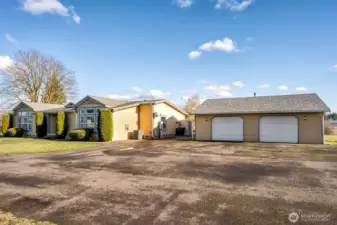 Large rambler and detached garage/shop. Endless opportunities here!