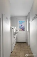 Laundry room is conveniently located off the hall and has ramp access to the spacious patio and back yard. Complete with included washer and dryer.