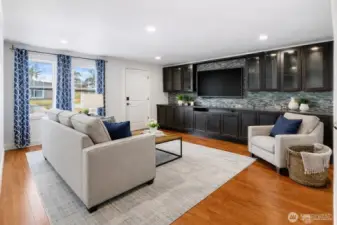 Virtually staged Living room Built in cabinets are there.