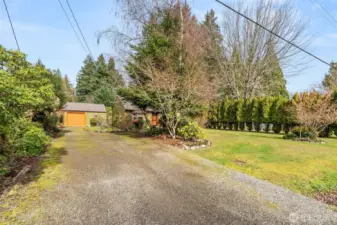 Oversized driveway for plenty of parking, including RV.