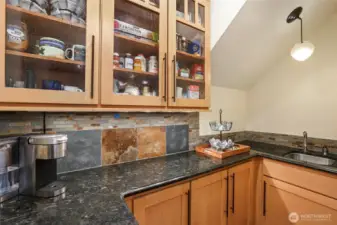 Butler's pantry with sink- perfect coffee bar setup!