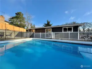 Heated swimming pool right from the main floor for year-round enjoyment and exercise.