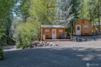 The freshly graveled driveway adds the perfect finishing touch to this beautifully maintained property