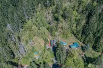 Bird’s-eye view showcases the home and grounds in all their peaceful, natural charm