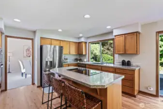 Newer stainless steel appliances. Counter seating.