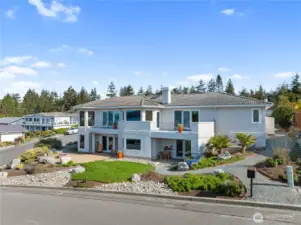 Easy care stucco siding, tiled concrete roof and flag stone patio for enjoying the fantastic Fidalgo Island weather.