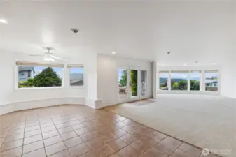 The lower level features a versatile mother-in-law suite or office area with a separate entrance, complete with a bedroom, wet bar, and refrigerator, offering privacy and functionality for guests or work-from-home professionals. A finished basement offers additional versatility, potentially serving as a wine cellar, and a delightful cabana provides an inviting outdoor retreat