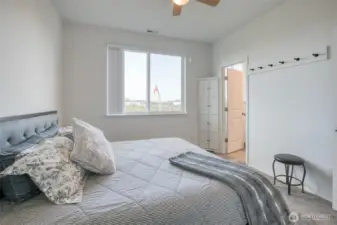 Spacious room with a ceiling fan for a little extra comfort on those summer evenings.