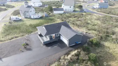 Going up a bit, you can get a feel for the overall property and the size of that amazing front deck!