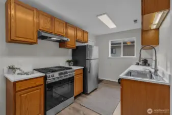 Cooking with gas, new counter tops, new and appliances.