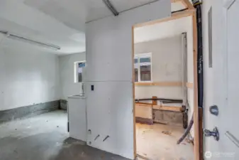 Extra space next to the Units carport. This is ready for your needs. Water and power already plumed in. Storage space, office, small ADU, workshop?