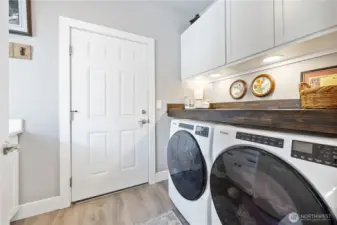 Main Entry Laundry with door access to 2-car garage