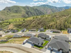 Drone view of home and natural mountain setting