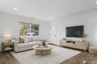 Large open and inviting living room. Photo is virtually staged.