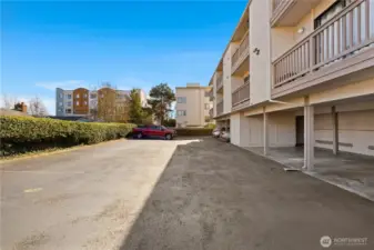 Two parking spots inside of locked gate