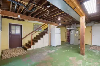 unfinished area with outside access.