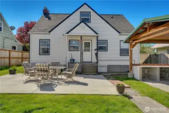 A 2019 fence fully enclosed the back yard with its multiple patios, a hot tub pad, and a detached garage.