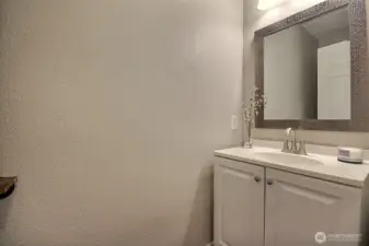 Main floor powder room – perfect for guests and everyday convenience.