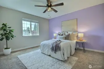 Peaceful primary suite with ensuite bath, walk-in closet, and extra closet for added storage.