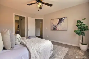 Primary features overhead fan and sunset views.