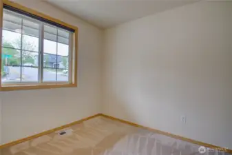 Office/Den large window for natural light. Office is just to the left as you enter the home