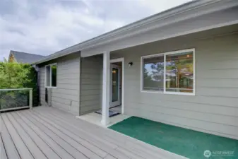 Partially covered deck area great for sitting outside in all weather