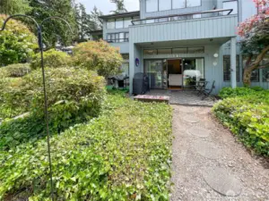 View of the patio and walkway to the unit.