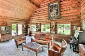 Large living area with lots of picture windows and French doors out to the deck. Beautiful territorial views as well.