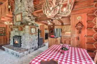 Several cozy sources of wood heat—including a Vermont Castings insert and classic wood cookstove—add to the home’s warm, timeless charm.