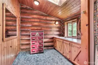 Primary bath with large shower and pocket door.