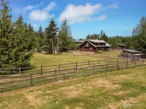 Additional features: fruit orchard, shelter for horses and a mini donkey, flexible pasture gates, generator, and included equipment and furnishings.