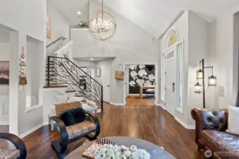 Beautiful entry with custom iron railing and new hardwood floors