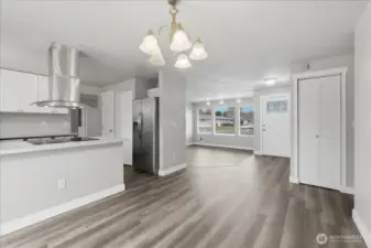Bright & Cheery Front Entrance To Living Room-Kitchen Area
