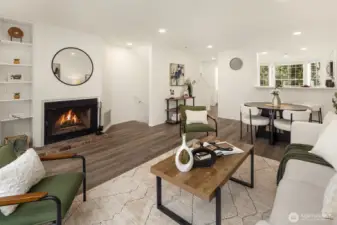 Warm and inviting great room with cozy wood burning fireplace