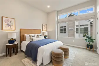 Primary suite with attached bathroom with duel vanity and shower