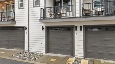 2 car tandem garage with side srorage area.