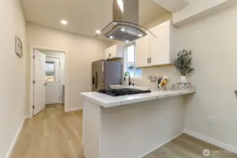 Brand new kitchen with stainless steel appliances & gas range