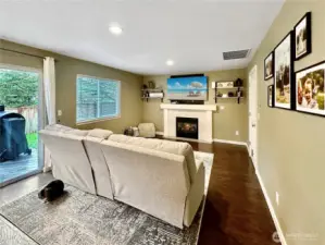 Full view of family room, access to laundry and garage on the right.