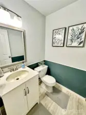 Charming, updated powder room on main floor.