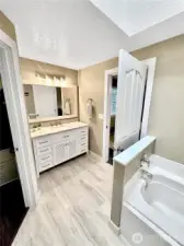 Looking towards vanity in primary bath.