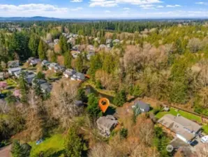 Rear view of home shows privacy the greenbelt provides.