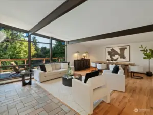 Inside, you will find mid century touches like the floor to ceiling windows and ceiling beams