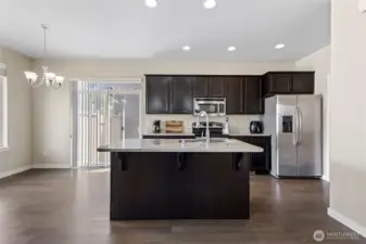 Kitchen open to living room and dining space