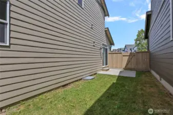 On the far side is a private patio off the dining area to enjoy.