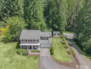 Overhead view of home and land. Driveway and road lead out Ames Lake-Carnation Road NE.  Private land offers expansive play spaces, garden area, shed and RV parking. Close to shopping, schools, parks and scenic trails.